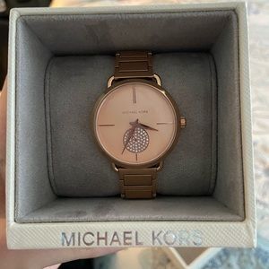 Brand new Michael kors watch in Rose Gold. Retails for $150 new.